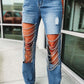 DIAMOND SWAG CHAIN RIPPED CUT OUT JEANS